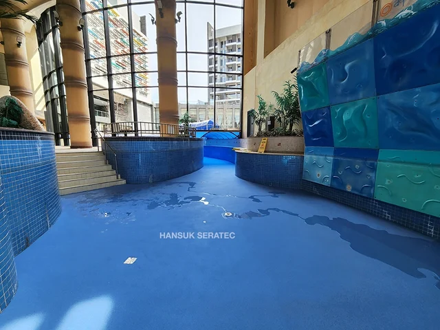 부여 롯데리조트 실내풀장 스톤카펫 Color Stone (멘트·규사·세라믹) 포장 시공 사진